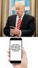 Trump Looking At Phone 10092018105241.jpg
